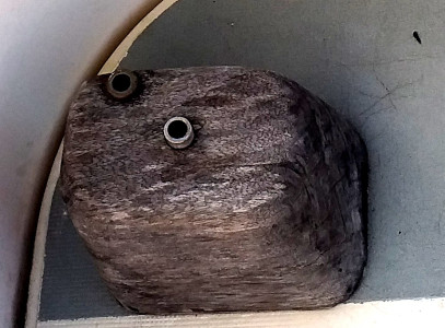 Le bloc de bois support de pilote